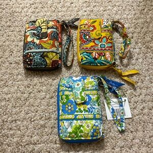 3 Vera Bradley Carry it all wristlets.